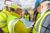 A group of workmen looking at some plans